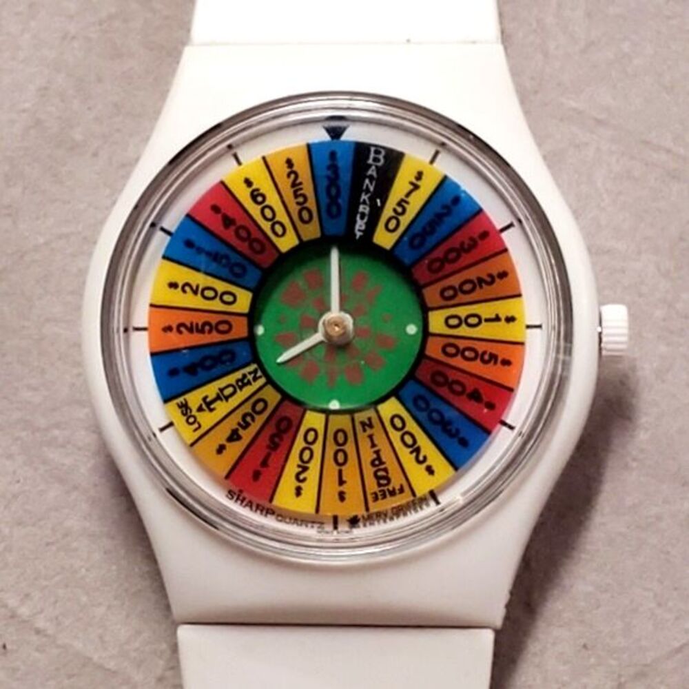 Sharp 1980's White Soft Plastic Merv Griffin Wheel of Fortune Quartz Watch
